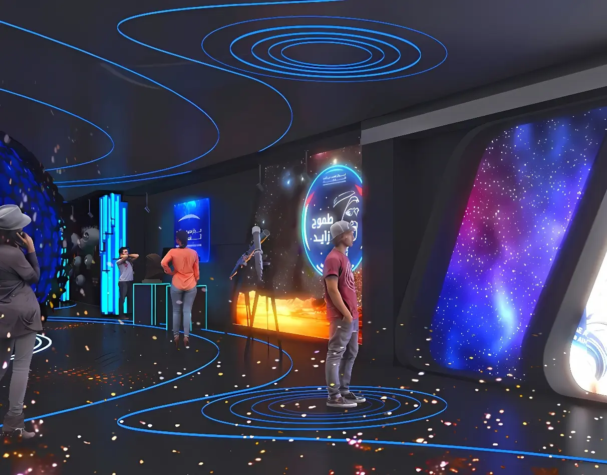 这是一张展示现代科技感室内空间的图片，几个人在观看和操作展示屏，环境装饰有未来风格，充满蓝色光带和星空图案。