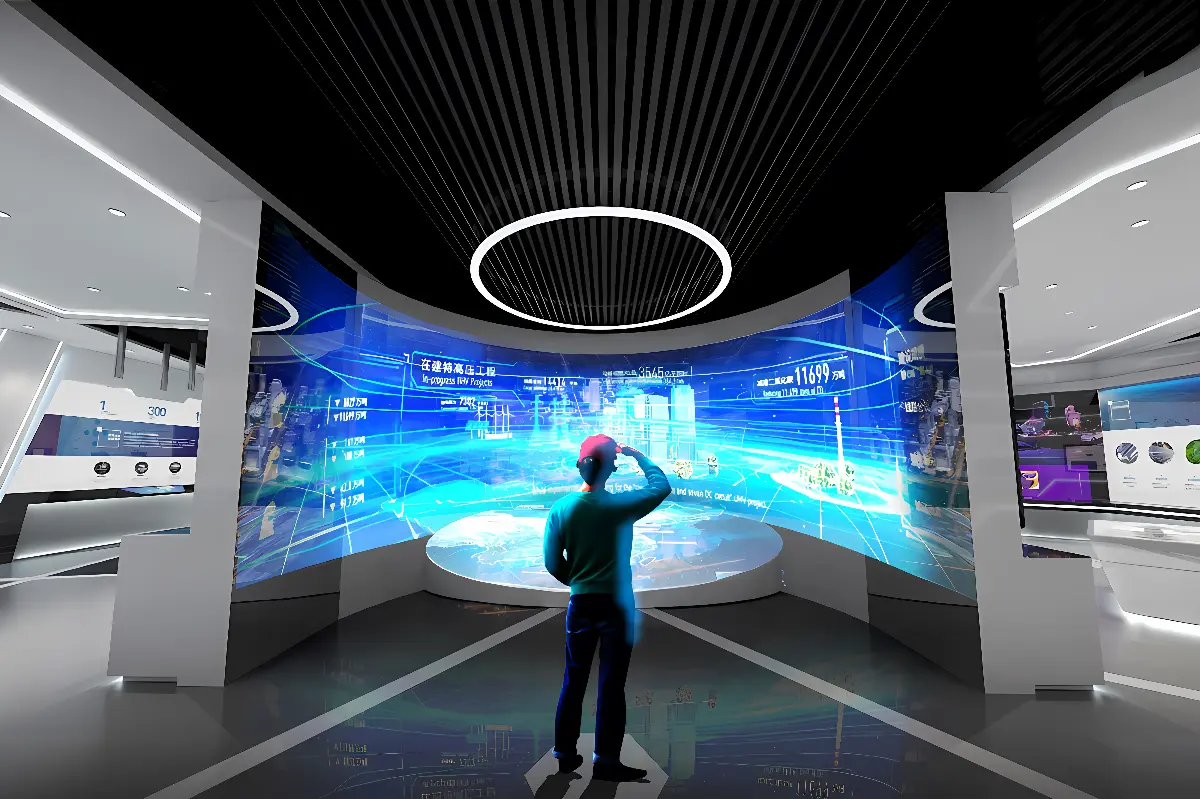 图片展示一位站立的人物，背对观众，面向一面大型屏幕，屏幕显示着未来科技风格的图像，四周环境现代且科技感十足。