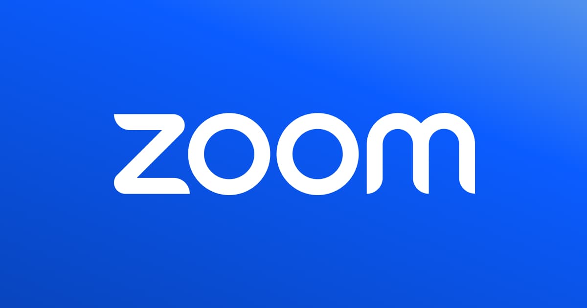图片展示的是蓝色背景上白色文字“Zoom”。这是一款流行的视频通讯软件的标志。