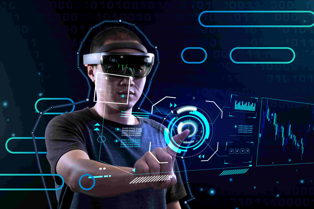 图片展示一位佩戴增强现实头盔的人，正在用手势操控虚拟界面，背景是数字化的图形和数据。