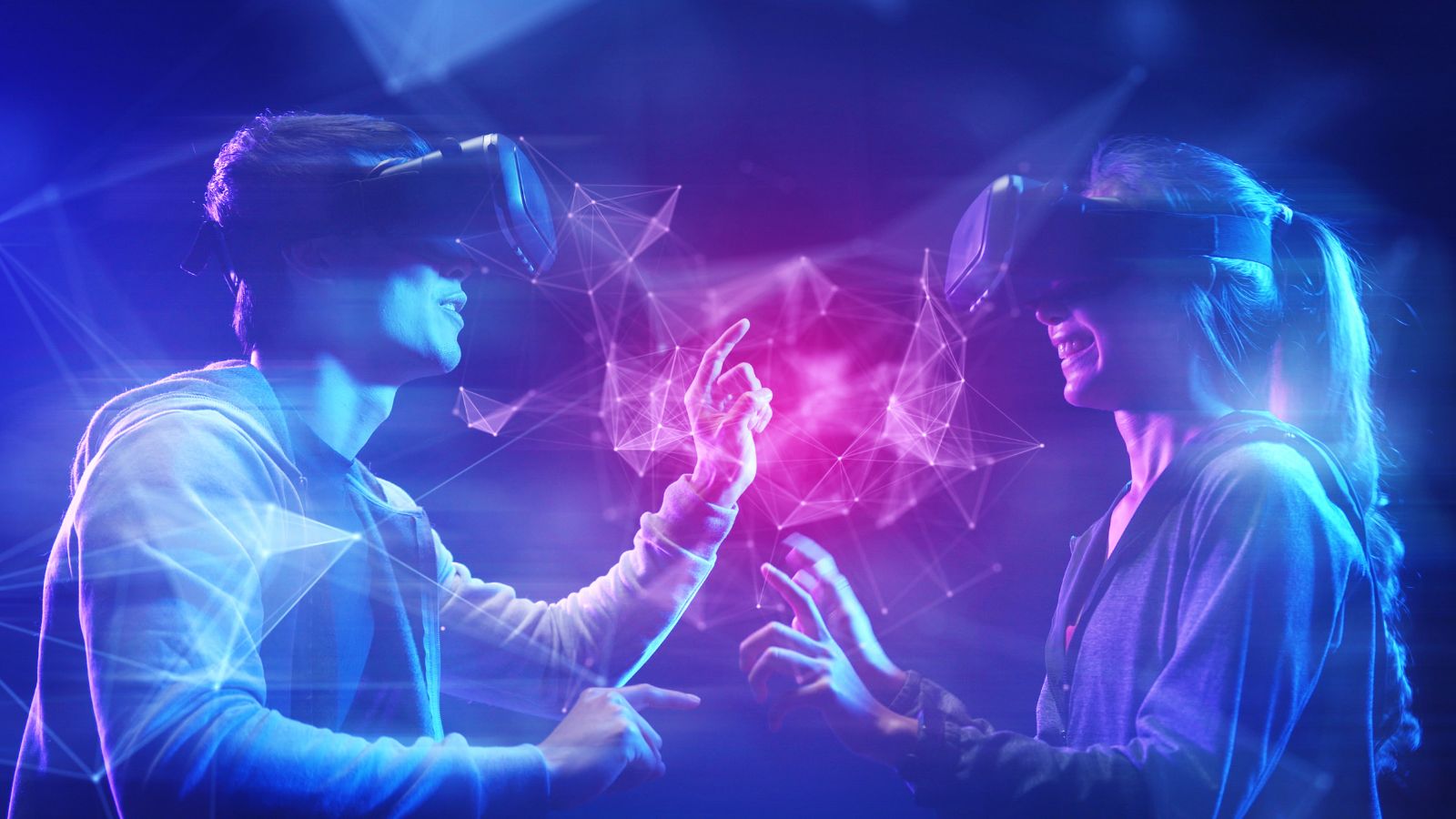 图片展示了两个人戴着虚拟现实头盔，似乎在体验VR技术，周围有未来感的光线和图形。
