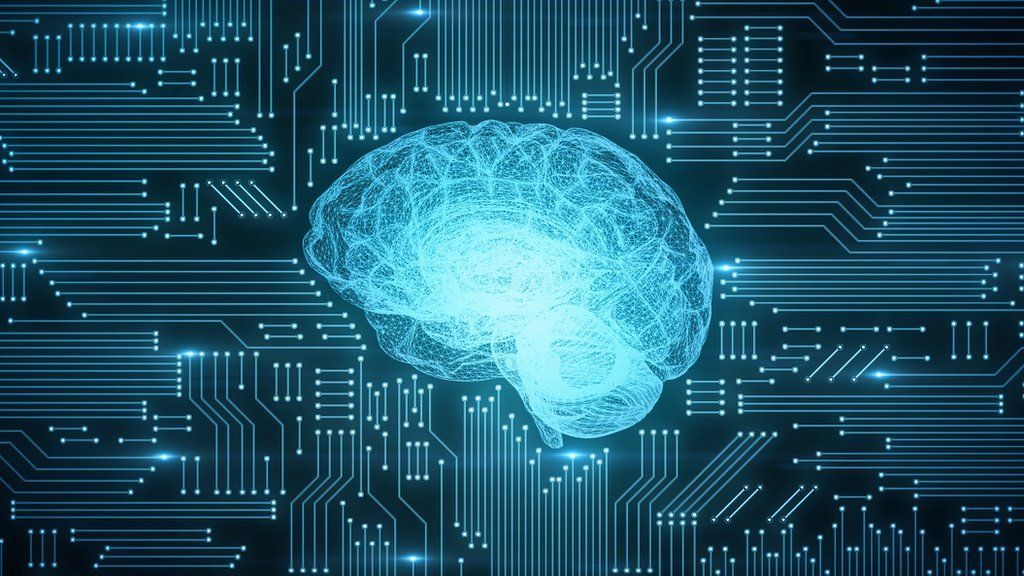 这是一张描绘大脑轮廓与电路板图案结合的图片，暗示着人工智能或大脑与技术的融合概念。