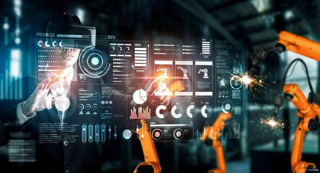 图片展示一位工程师在高科技控制面板前操作，背景有自动化机械臂进行焊接作业，体现现代工业自动化和信息化水平。